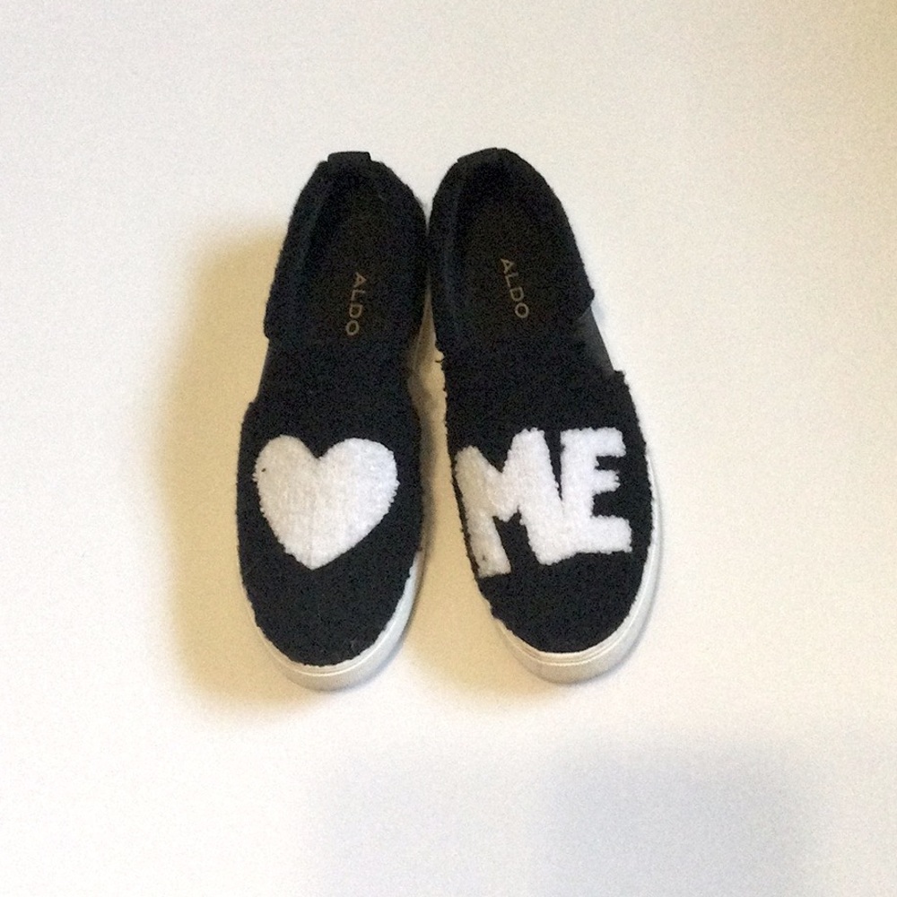 ALDO black and white platform sneakers.